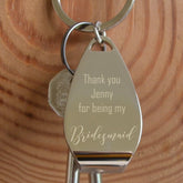 a personalised engraved bottle opener keyring with the message "thank you Jenny for being my bridesmaid"