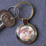 Personalised metal circular keyring with a family photo in the centre 